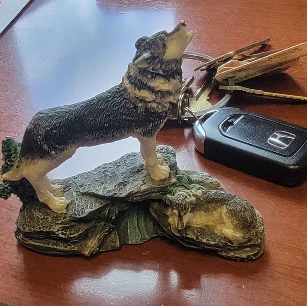 Porcelain wolf and cub figurine